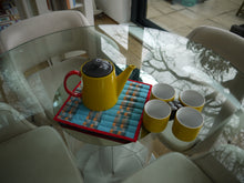 Load image into Gallery viewer, Blue, Grey, White and Orange striped Trivet