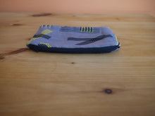 Load image into Gallery viewer, Black and yellow striped zippered pouches