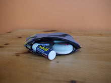 Load image into Gallery viewer, Black and yellow striped zippered pouches