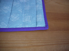 Load image into Gallery viewer, Blue Cross Hatch Trivet With Purple Trim