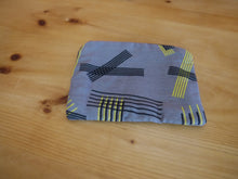 Load image into Gallery viewer, Black and yellow striped zippered pouches